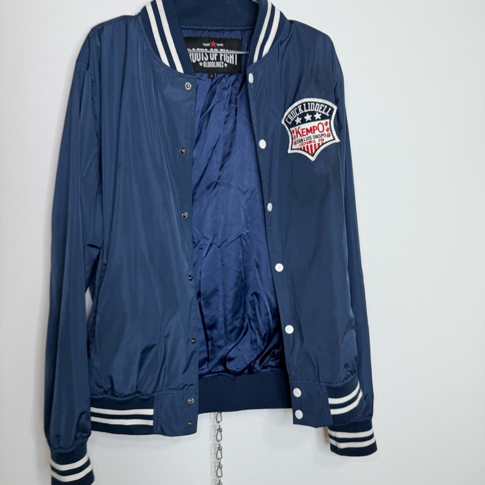 Roots of fight navy blue bomber size L